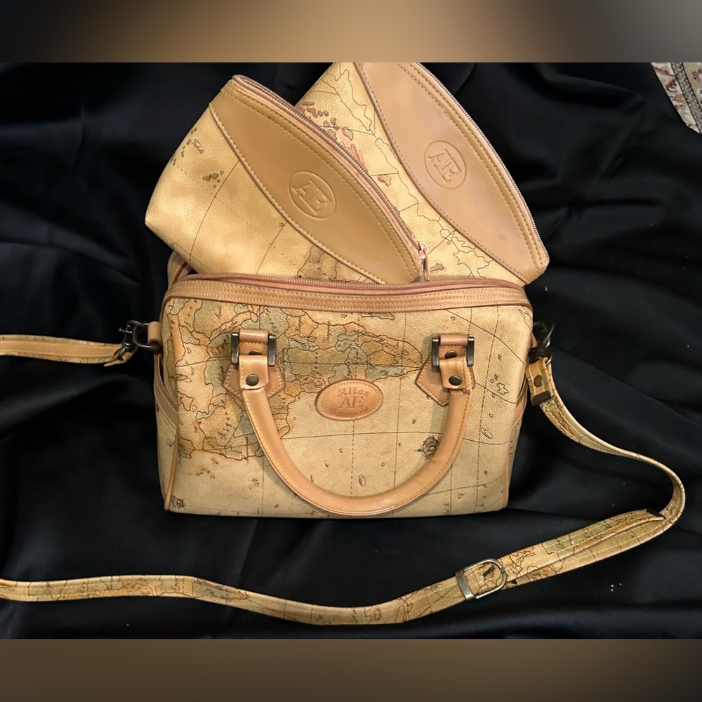Allen Edwards bag with shoulder strap and two inside smaller bags.